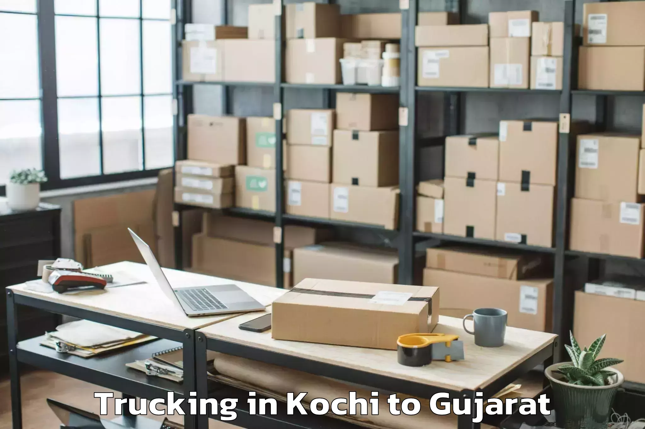 Affordable Kochi to Rk University Rajkot Trucking